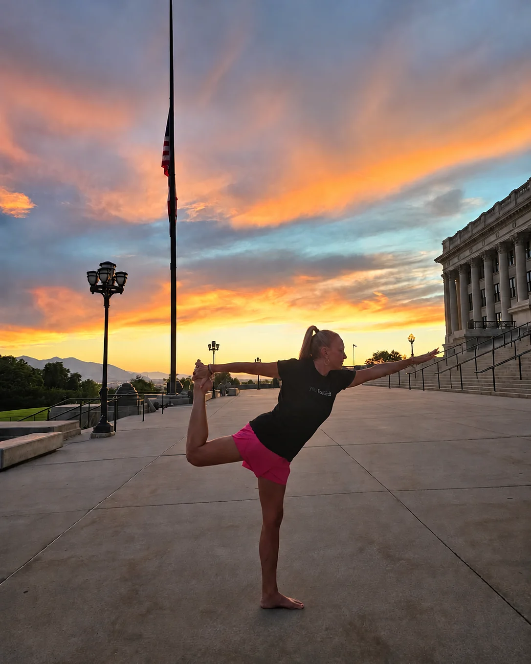 Brittany Horne, founder of Digital Design SLC SEO, in a yoga pose at sunset in Salt Lake City